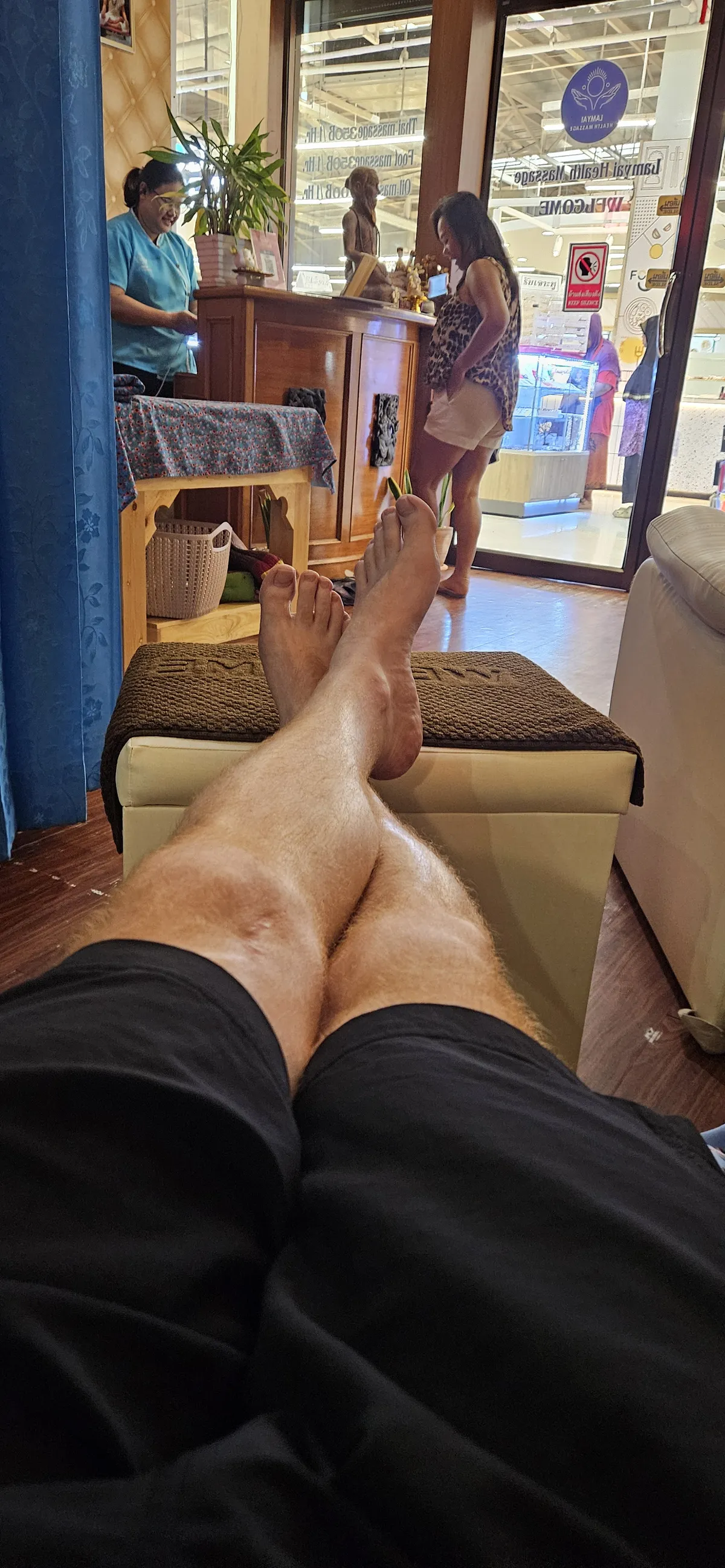 Jules relaxing with a foot massage during a forced AI wellness break